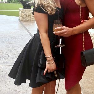 Black elegant cocktail dress with puff bottom
